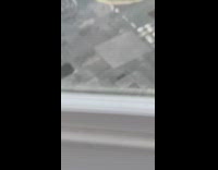 Man blue glossy top sidewalk photo shoot