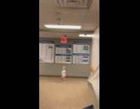 Guy in hospital baby walks by