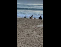 Two women different beach photo and video