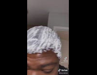 Guy puts relaxer in hair to make it straight 