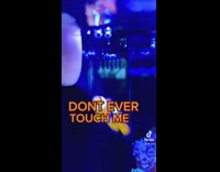 Nemo fish hits and bites finger in water tank