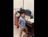 Kid repeat words told by the adult