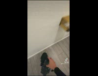 Girl has laundry chute hole in bathroom 