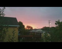 Lightning sunrise pink orange sky yellow house 