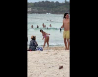 Woman in bikini twerks for beach video Part 1