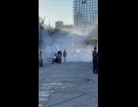 Big bike riders filming near police officers 