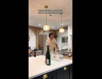 Male friends compliments pink dress of woman