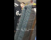 Guys carry bus couch onto subway bus train public transit