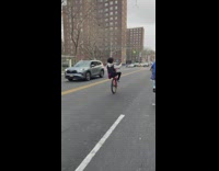 Guy doing wheelie on bike missing front wheel