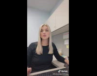 Girl black shirt on computer scrolling around sheets