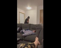 Girl lifts bag and falls backwards from weight 