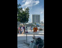 Collab IITW - Woman in white crop top tiktok dance while two monks watch