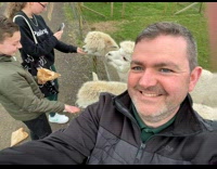 Little girl fed and got spat by one of the Alpacas at the barn