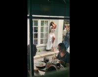 Woman white dress sexy poses on alley