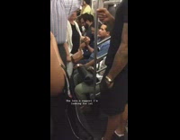 Guy lady hold hands crowded subway train 