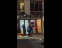 Guy practice boxing alone on the street