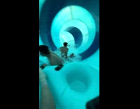 Collab ClipsIG - Guys goof around in water slide slow motion