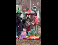 People wears headphone dance party at park