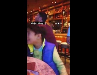 Collab PubityPets - Boy in blue vest dances in restaurant seat 