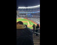 Woman with a baseball cap tiktok dance at the stairs