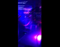 Waiter dances with tray of drinks at club and drop them all