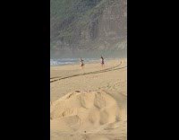 Grass skirt coconut bra blue beach sand 