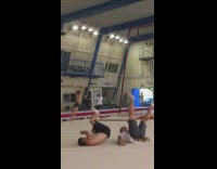 Guy does backflip on friends shoulders