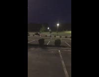 Truck Drives In Parking Lot and Big Firework Goes Off on Ground