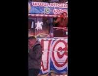 Birthday girl throws dollar bills outside her party bus