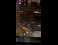 Convertible car burning on the street 