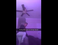 Man jump from chair break ceiling fan lamp