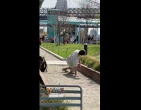 Male Dancer Films Floor Performance at Park 
