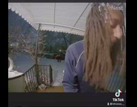 Guy gets hit in the head with a snowball 