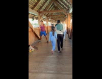 Man NPC TikTok live at wooden hallway