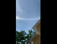 Man Shows Halo in Sky Around Neighborhood
