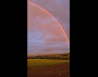 Double Rainbow on Rural Farmland by Sunset