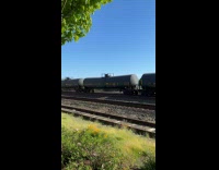 Train with Boeing fuselages cargo on railtracks
