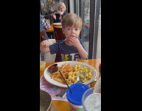 Little boy dances mac and cheese 