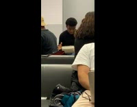 Guy puts food in mouth and spits it out