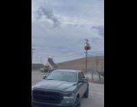 Truck gets caught on electrical wires and pulls it down