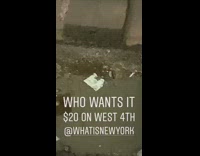 Torn $20 dollar bill on subway train tracks west 4th