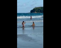 Woman in bikini lie down beach photoshoot Part 1