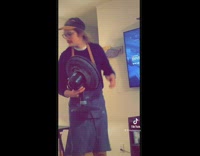 Cat on wall hammock reaches for guys hat compilation