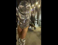 Lady in Disco Ball Costume Dances 
