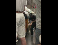 Guy flips and does breaking moves in black outfit 