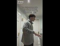 Guy grey hoodie stretching