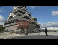 Man in black jacket tiktok dance in front of the temple