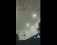 Girl gets up from couch runs down hallway 