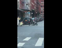 woman black outfit modeling street