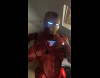 Woman wears Iron Man armor then dances